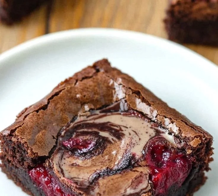 Delicious raspberry swirl brownies with rich chocolate and raspberry swirls