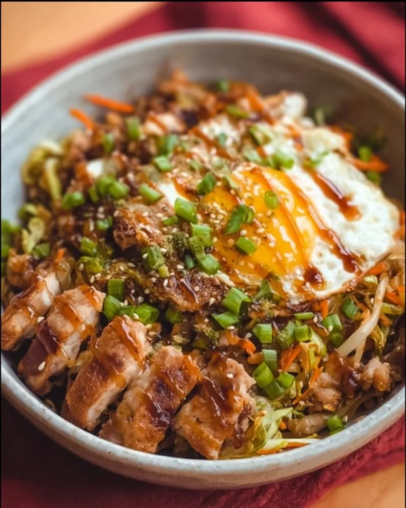 Delicious Chicken Egg Roll Bowl filled with vibrant vegetables and savory chicken.