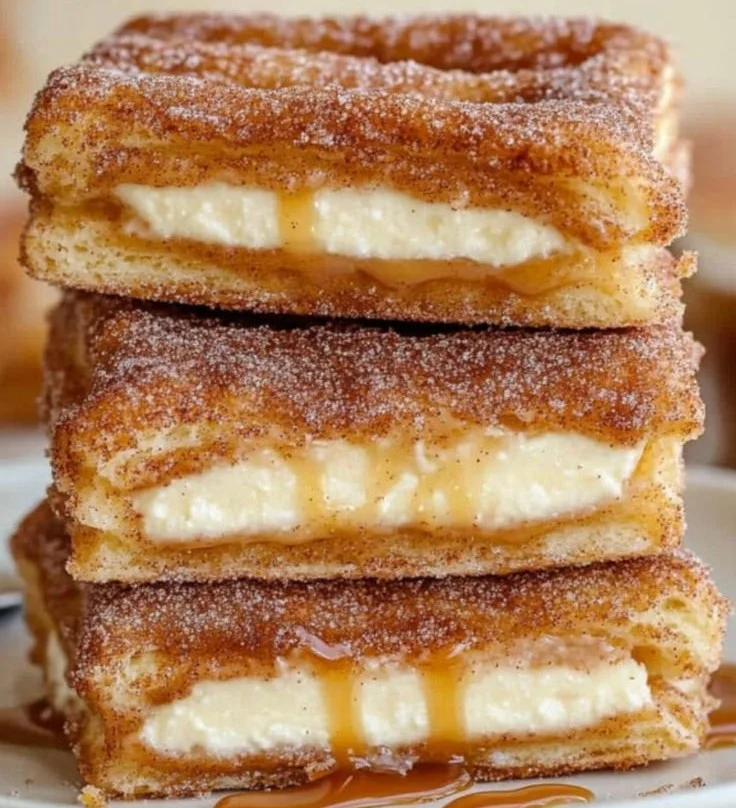 Delicious Churro Cheesecake topped with cinnamon and sugar