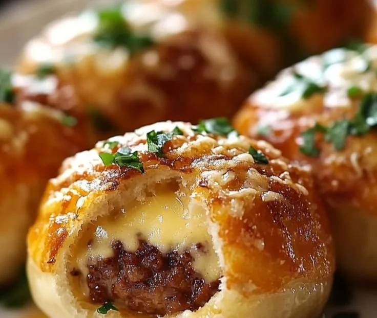 Garlic Parmesan Cheeseburger Bombs served on a plate