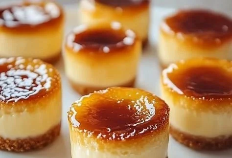 Mini crème brûlée cheesecakes topped with caramelized sugar crust