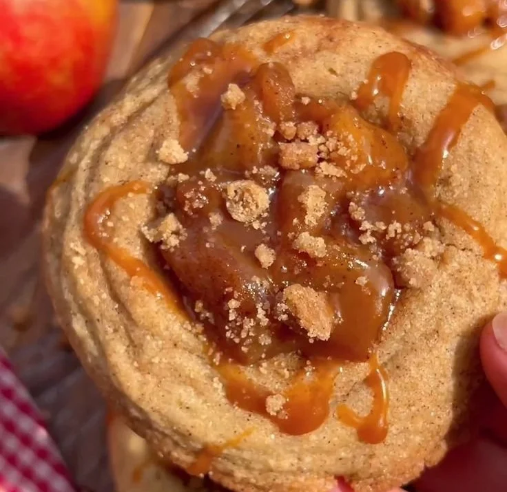 Delicious Salted Caramel Apple Pie Cookies displayed on a wooden table